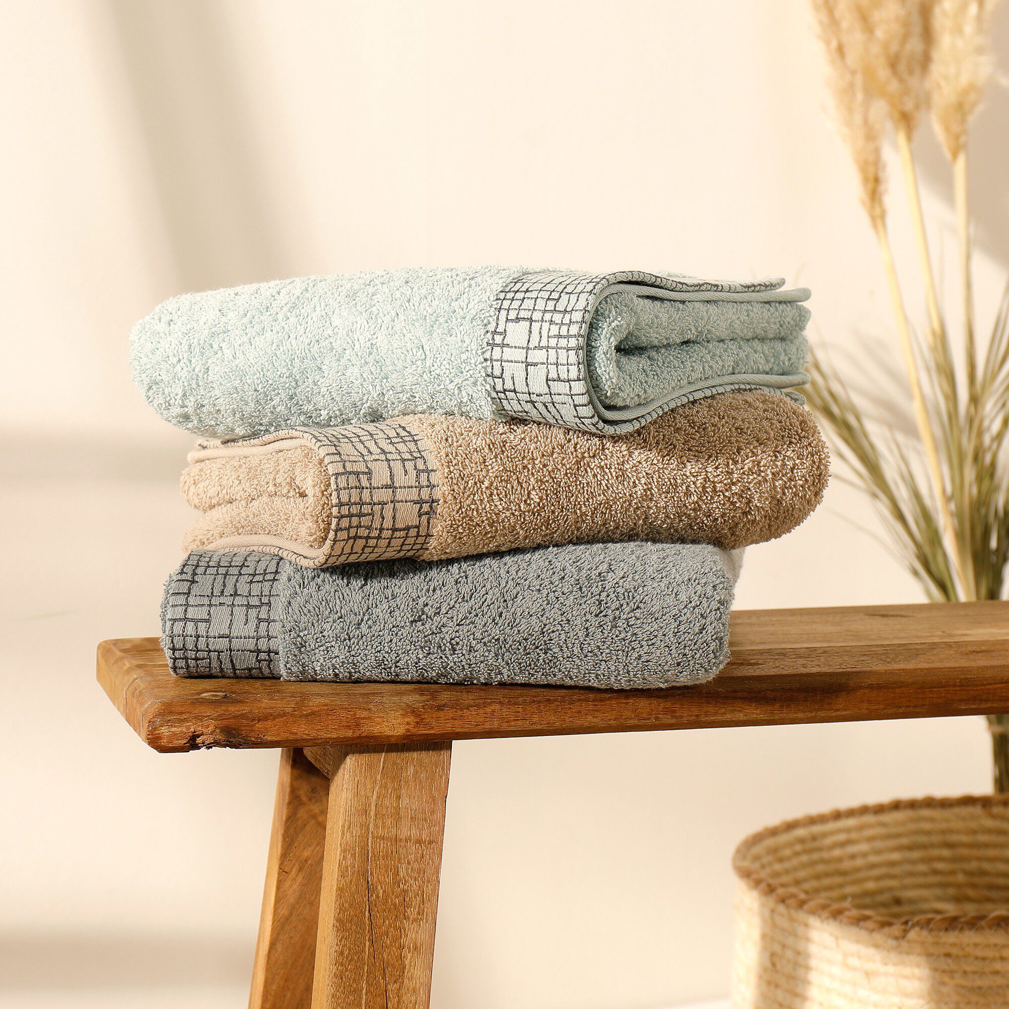 Serviette éponge liteau jacquard quadrillé
