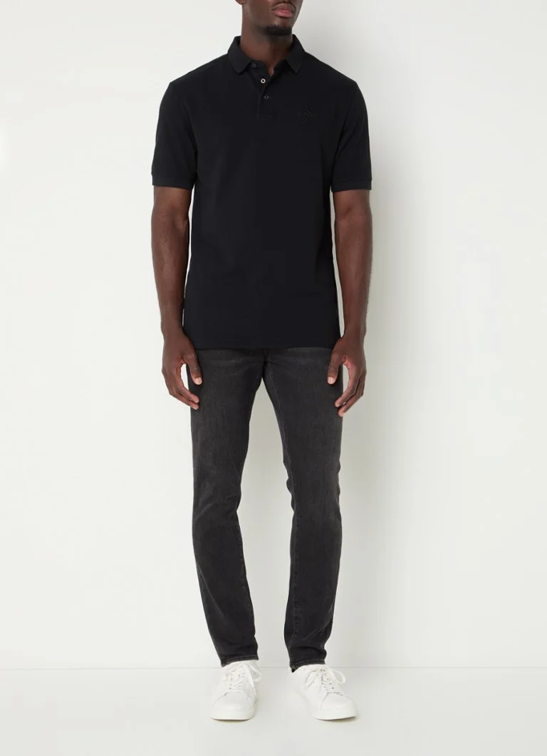 Polo Armani Exchange de corte regular, confeccionada em piqué de algodão com bordado do logotipo.