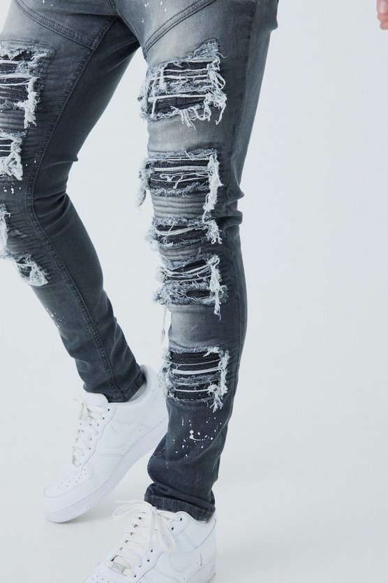 Super Skinny Bikerjeans mit Rissen und Farbspritzern