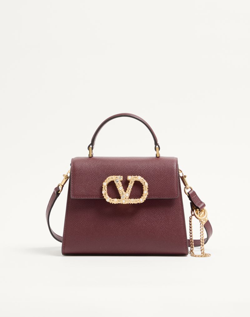 Sac à main Valentino Garavani Vsling petit modèle en cuir de veau grainé avec logo bijou