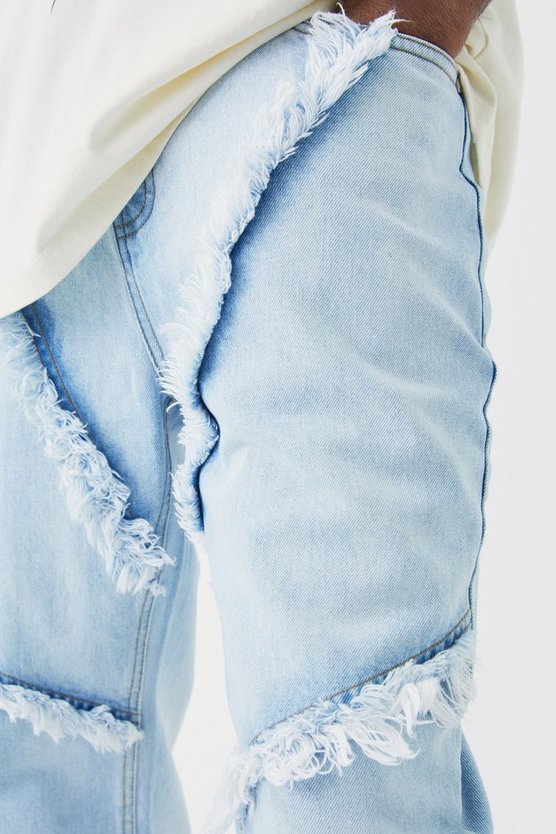 Tall lockere Schlagjeans mit ausgefranstem Saum