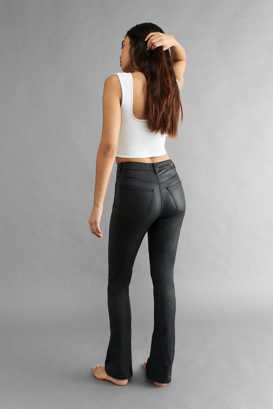 Coated bootcut jeans
