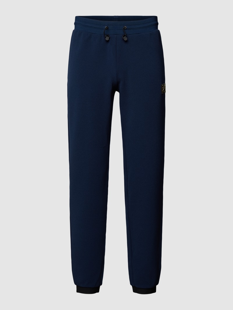 Sweatpants im fein strukturierten Design in marineblau