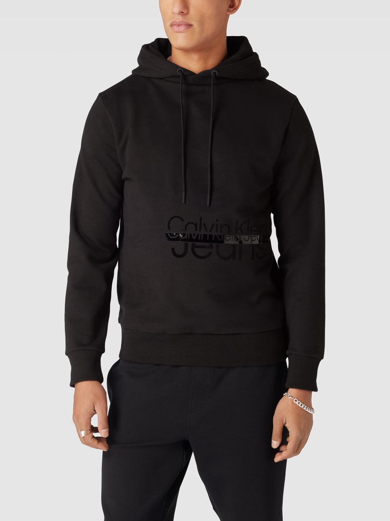 Hoodie mit Label-Print Modell 'DISRUPTED' in schwarz
