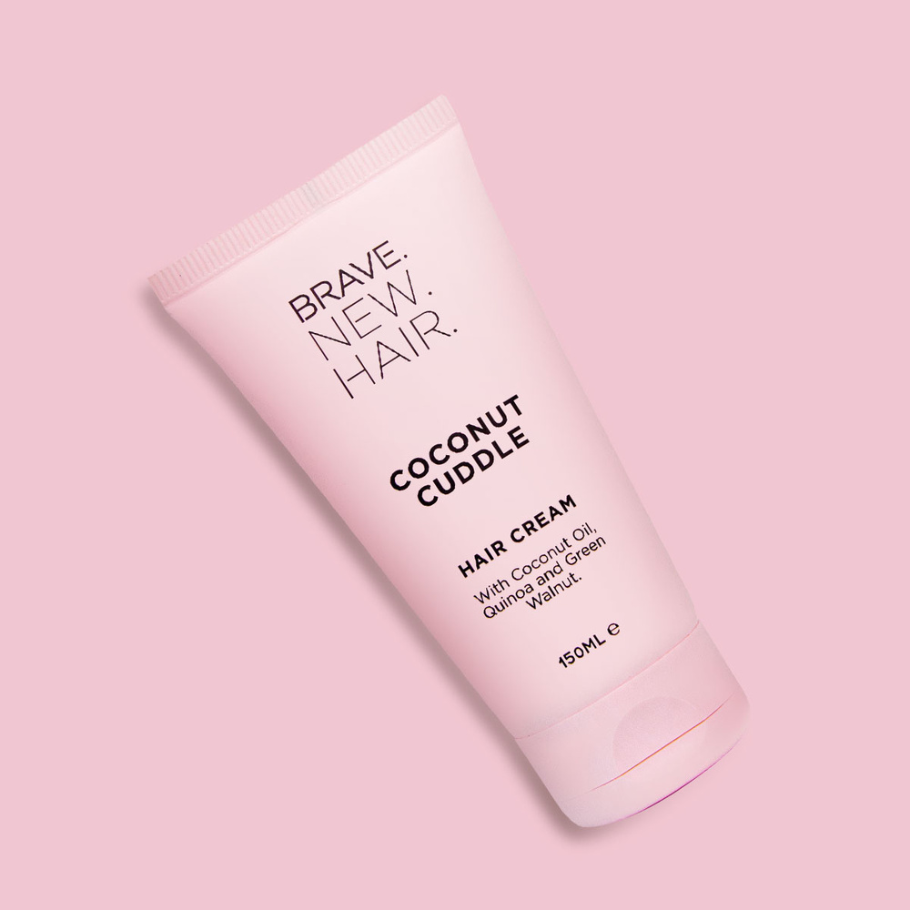 brave new hair Coconut Cuddle Crème hydratante capillaire enrichie ennoix de coco, quinoa et noix verte.