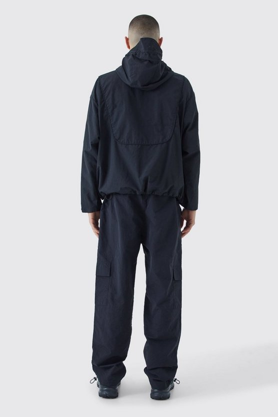 Regenjacke mit halbem Reißverschluss und Kapuze