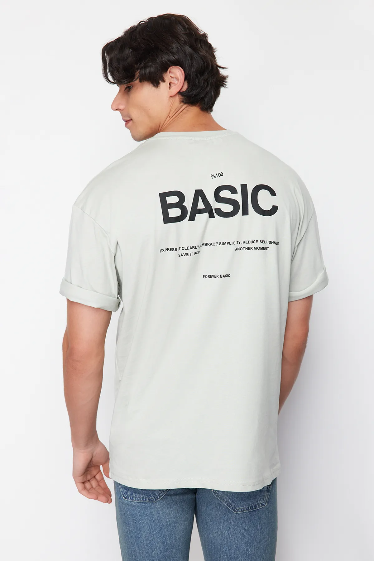 Trendyol Collection  Graues übergroßes Strick-T-Shirt mit Rundhalsausschnitt und Slogan TMNSS23TS00263