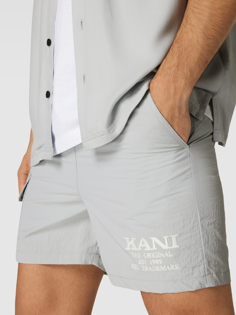 Shorts mit Label-Stitching - P&C X Karl Kani in hellgrau