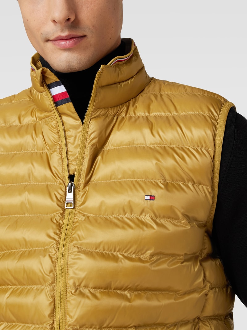 Steppweste mit Logo-Stitching Modell 'PACKABLE CURCULAR VEST' in dunkelgelb