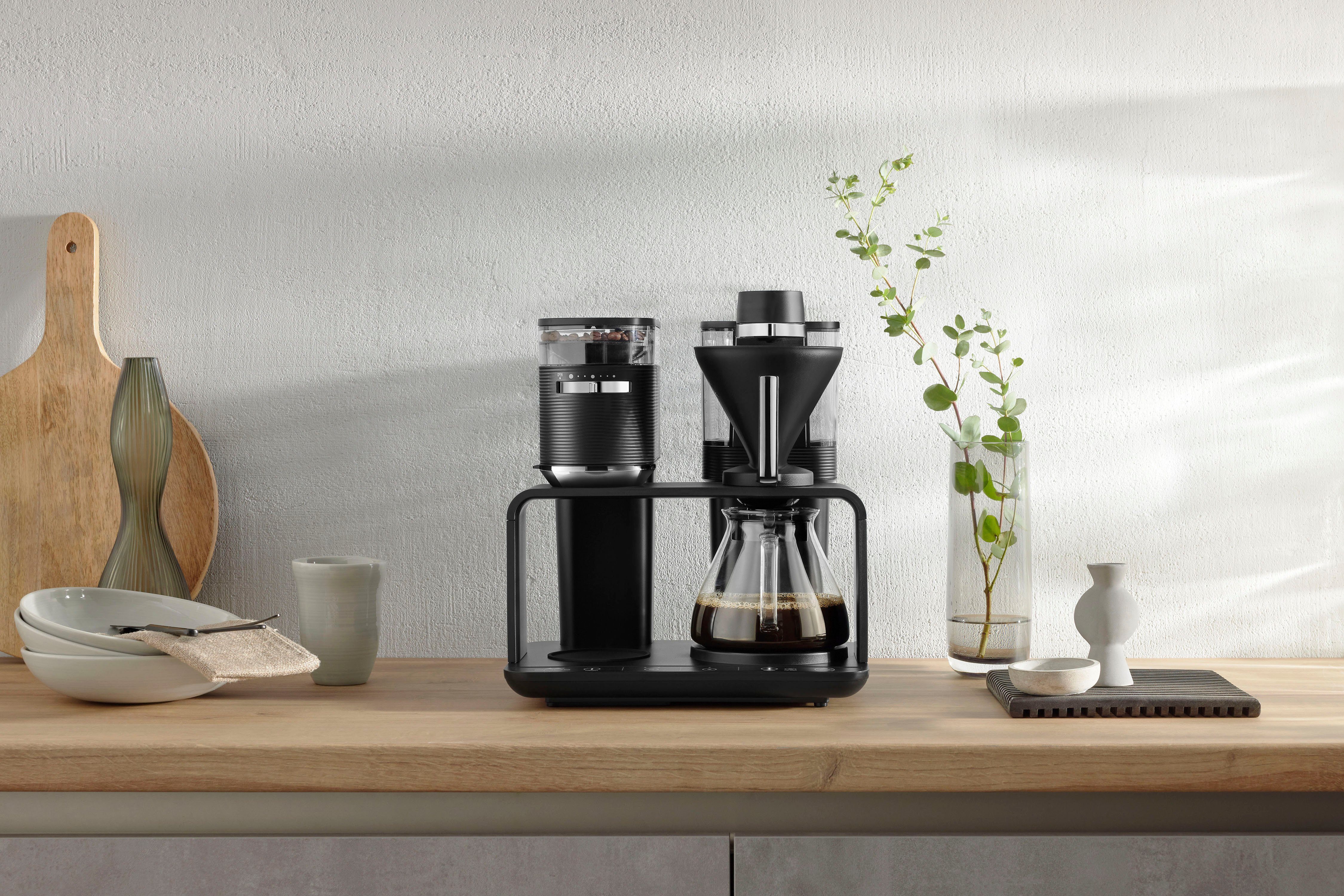 Melitta Kaffeemaschine mit Mahlwerk EPOS® 1024-03 Schwarz/Silber 360°rotierender Wasserauslauf, 1l Kaffeekanne, Papierfilter 1x4