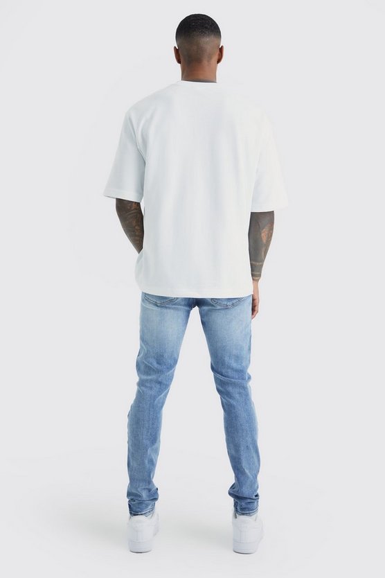 Gebleichte Skinny Stretch Jeans mit Riss am Knie