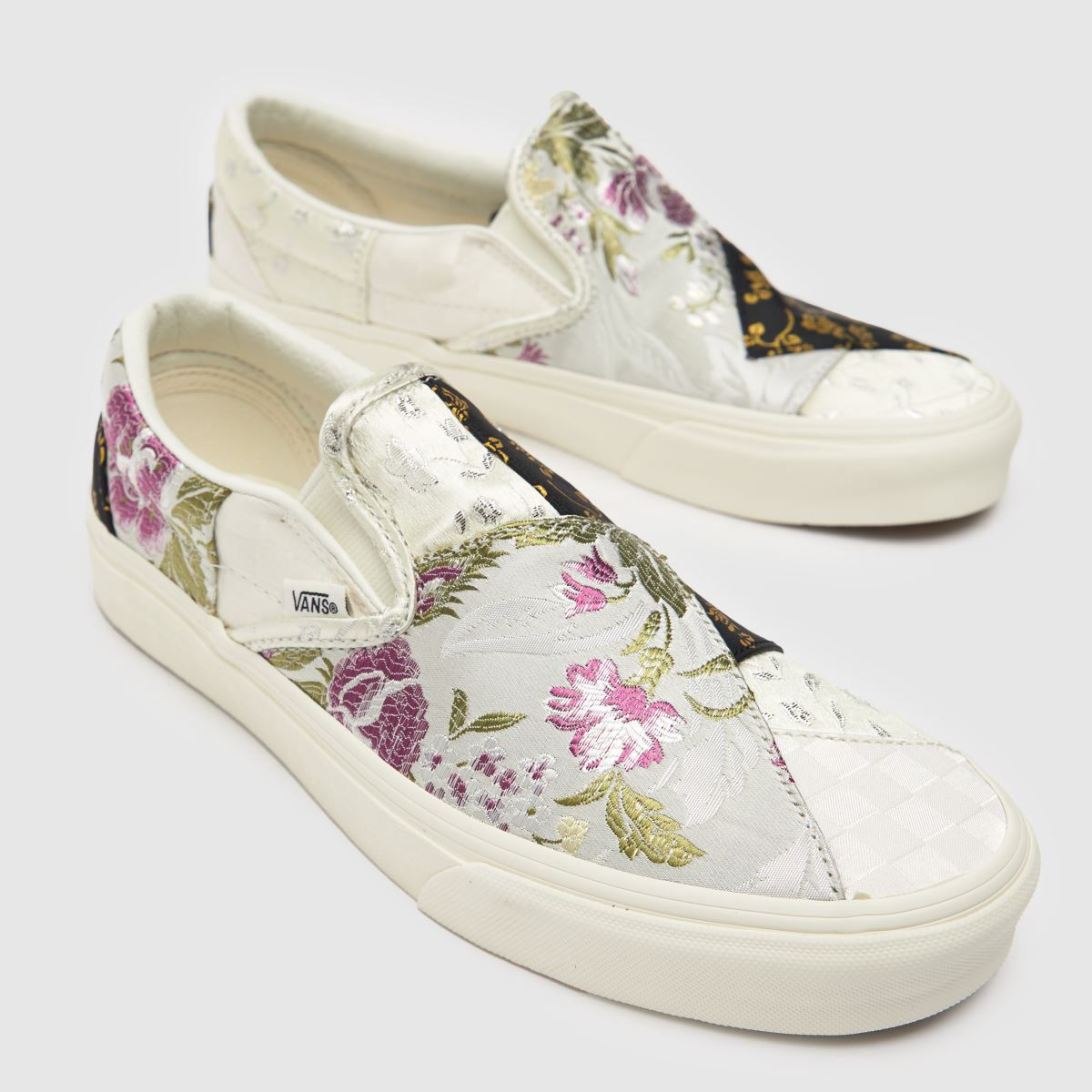 Vans – Slip-on-sneakers med lappmönster i grått och svart