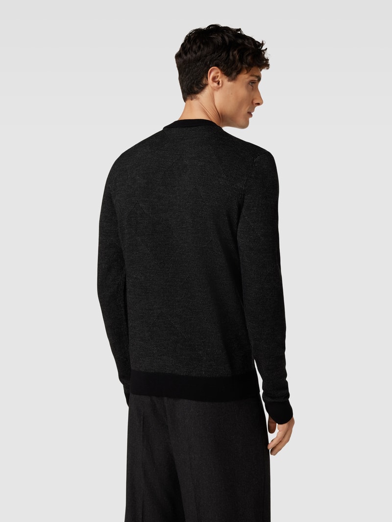 Strickpullover aus Schurwolle Modell 'Motivo' in schwarz
