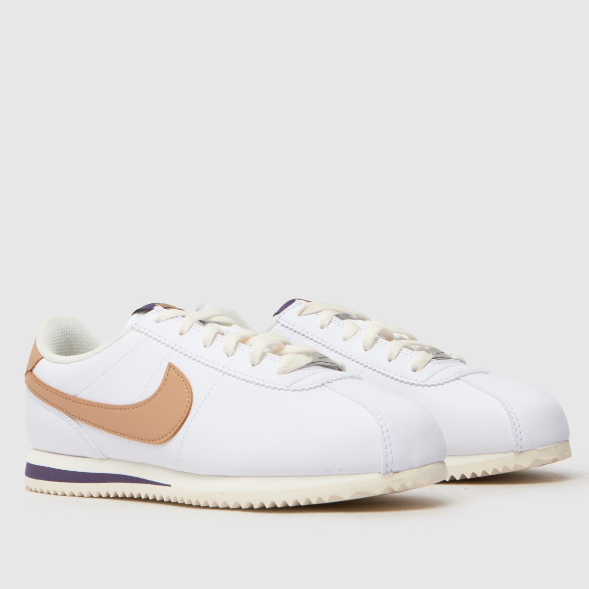 Beli in bež športni copati Nike Cortez Youth
