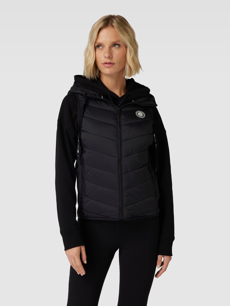 Steppweste mit Label-Patch Modell 'WET CIRE' in schwarz
