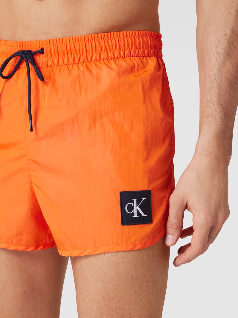 Badehose mit Label-Patch Modell 'SHORT RUNNER' in orange