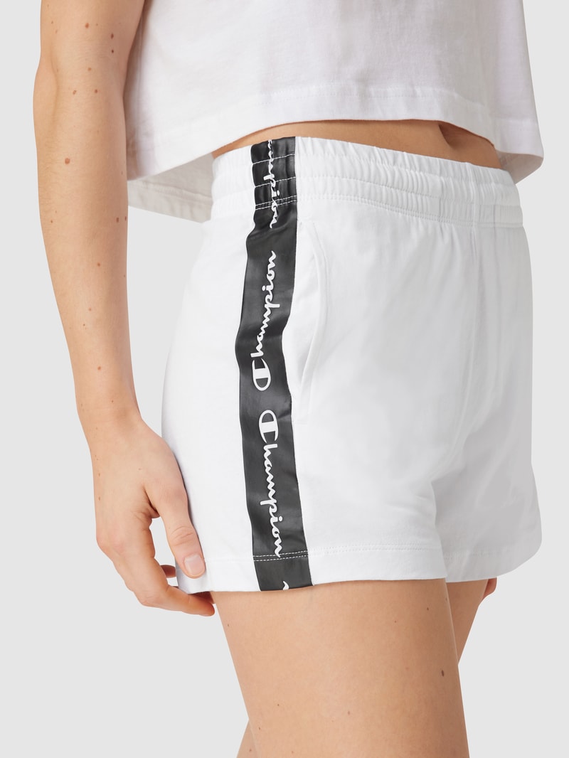 Sweatshorts mit Galonstreifen in weiß