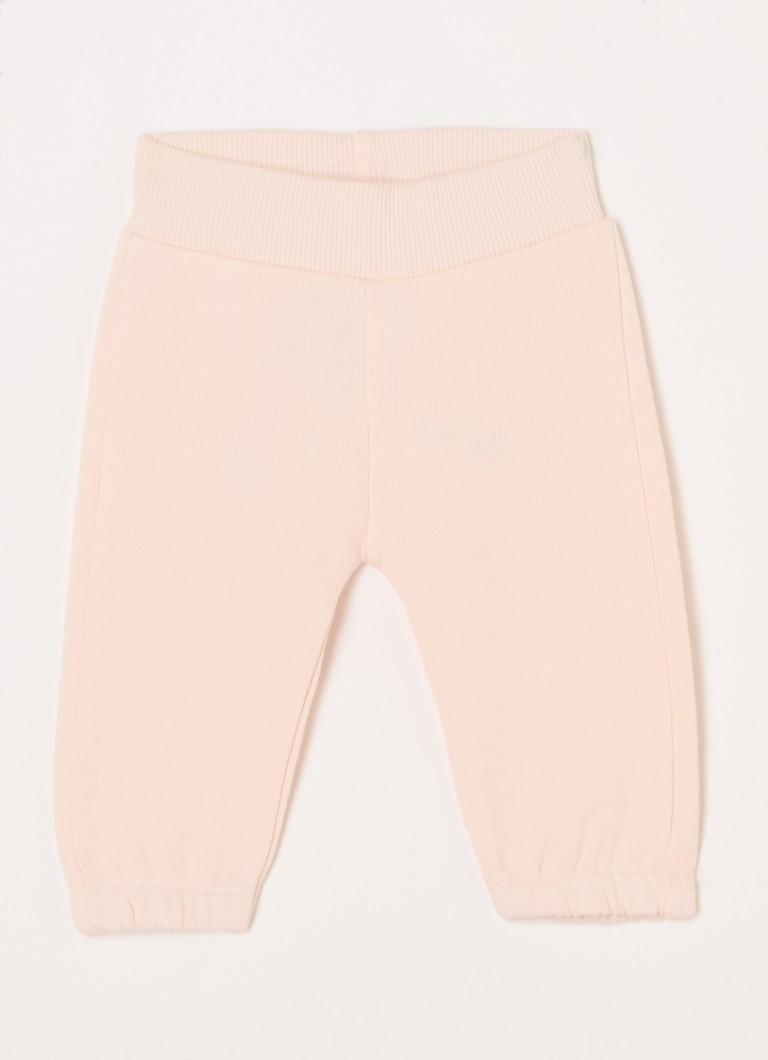 Pantaloni de trening Benetton cu croială conică și broderie.