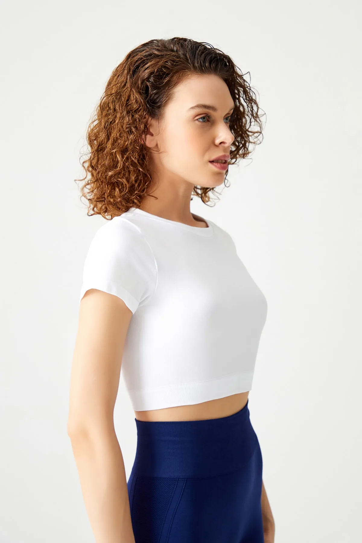 LOS OJOS  Weißes, nahtloses, weich strukturiertes Sport-T-Shirt-Crop-Top