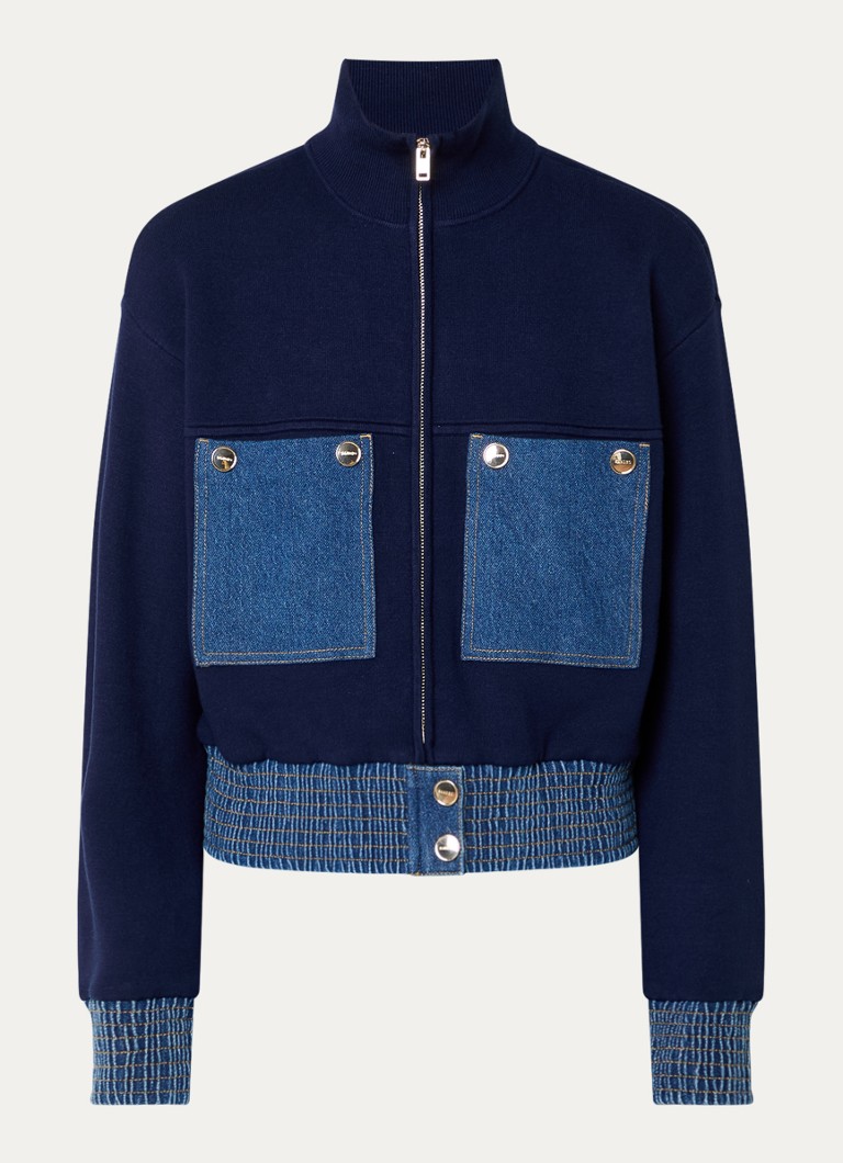 Sandro  Fijngebreid vest met details van denim