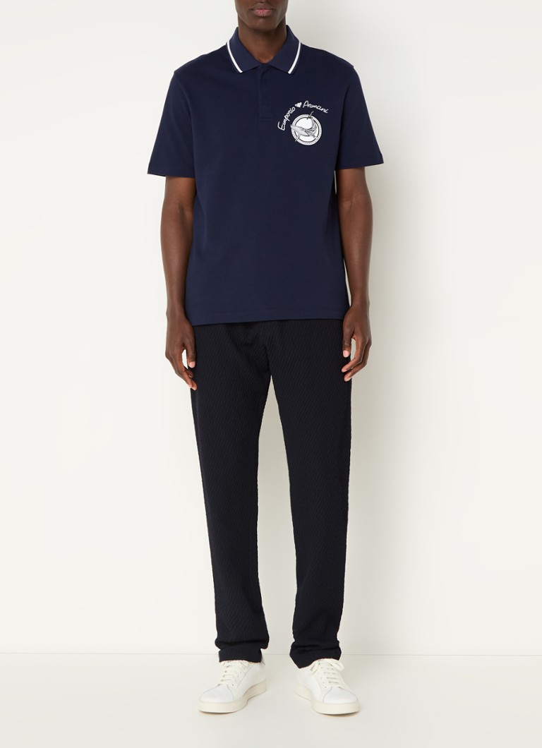Pantaloni drepți din lână virgină cu buzunare laterale, de la Emporio Armani.