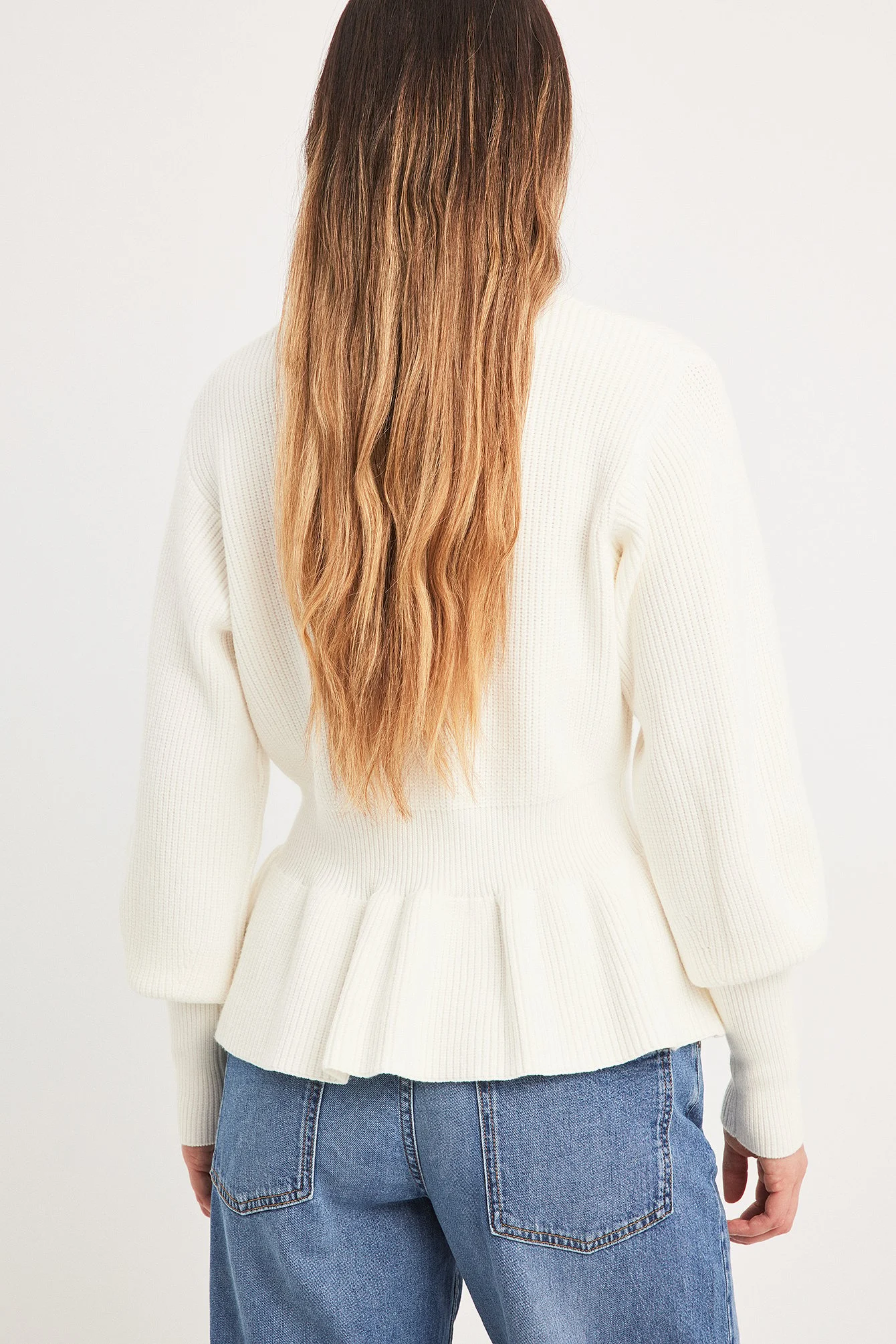 Strickpullover mit Schößchen