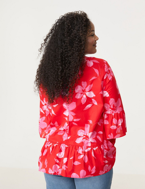 Ausgestellte Bluse mit Volants