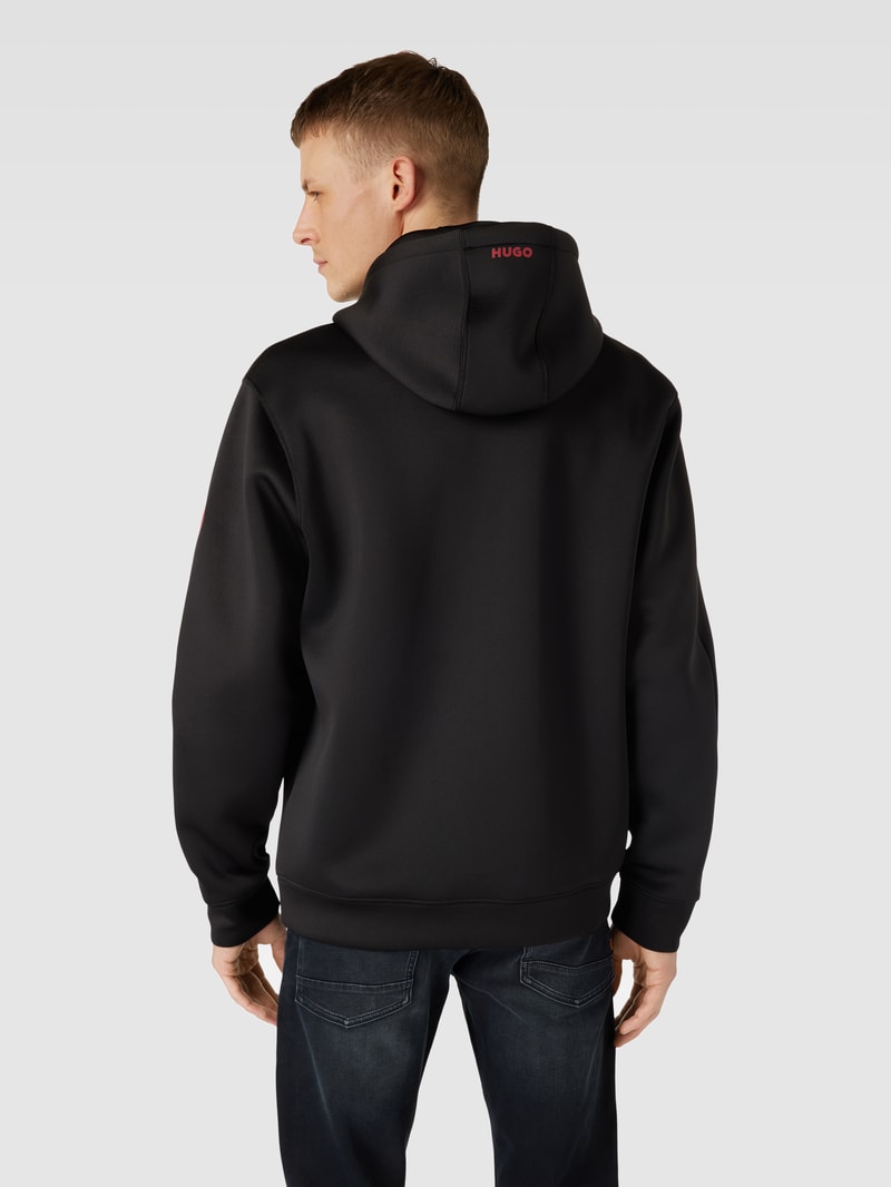 Hoodie mit Reißverschlusstasche am Arm Modell 'Diavol' in schwarz