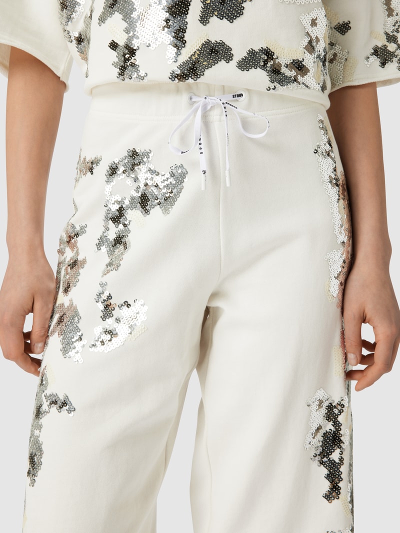 Sweathose mit Pailettenbesatz in offwhite