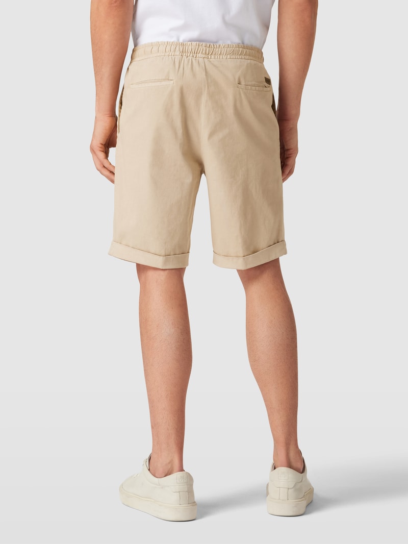 Shorts mit seitlichen Eingrifftaschen in schlamm