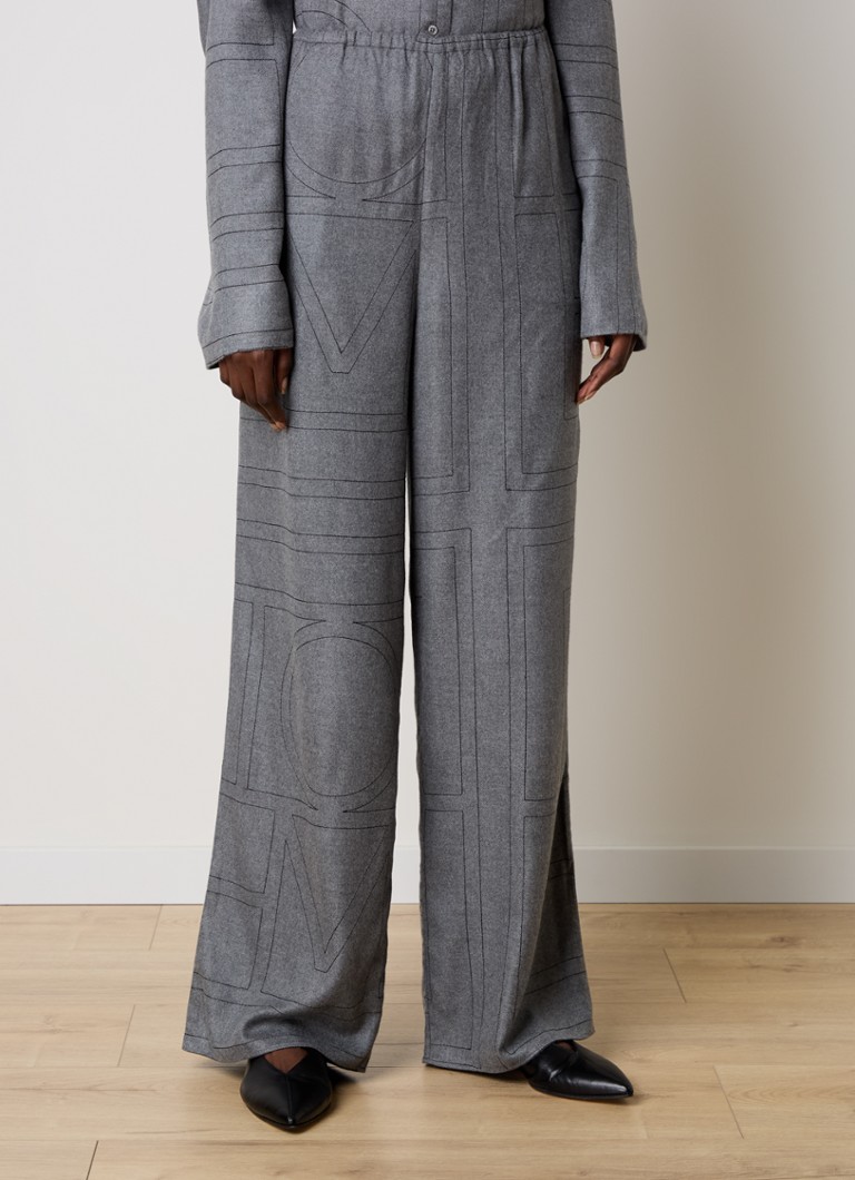 Pantaloni TOTEM a vita alta e gamba larga con logo ricamato.