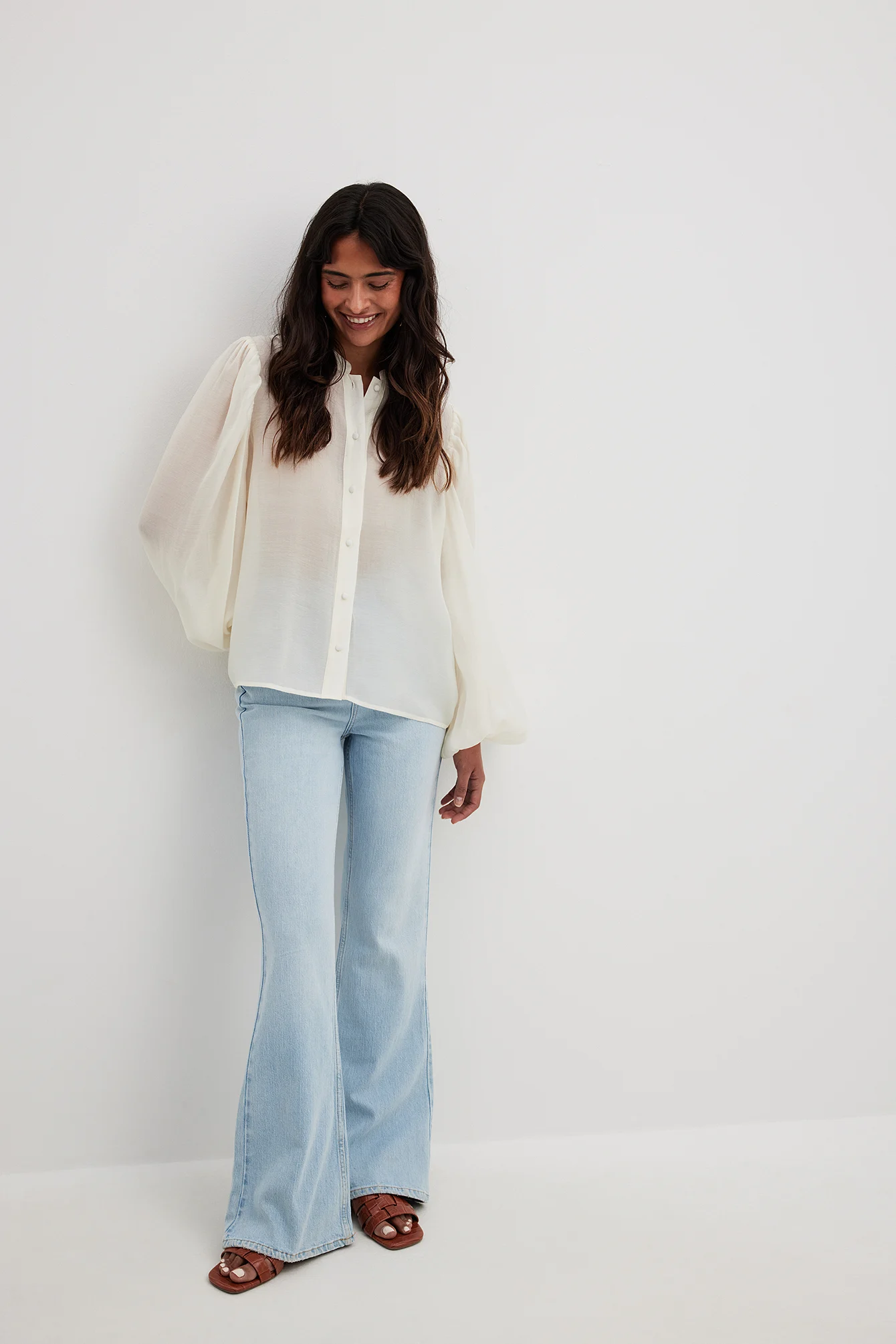 Bluse mit voluminösen Ärmeln und Knopfldetail