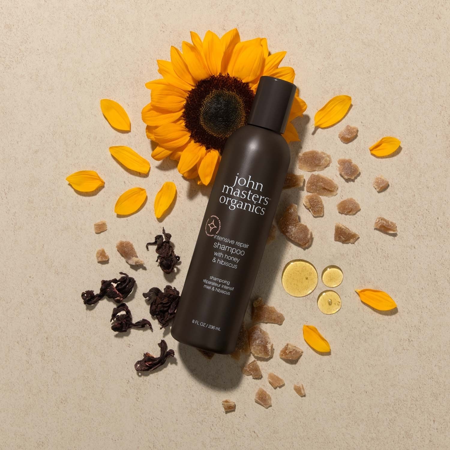 John Masters Organics medus un hibiska šampūns bojātiem matiem