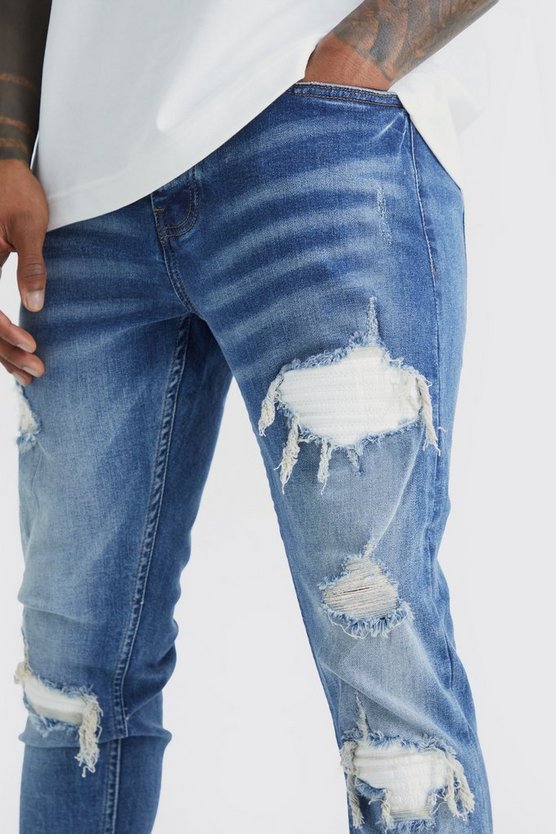 Skinny Biker Jeans aus Stretch mit Rissen und Flicken