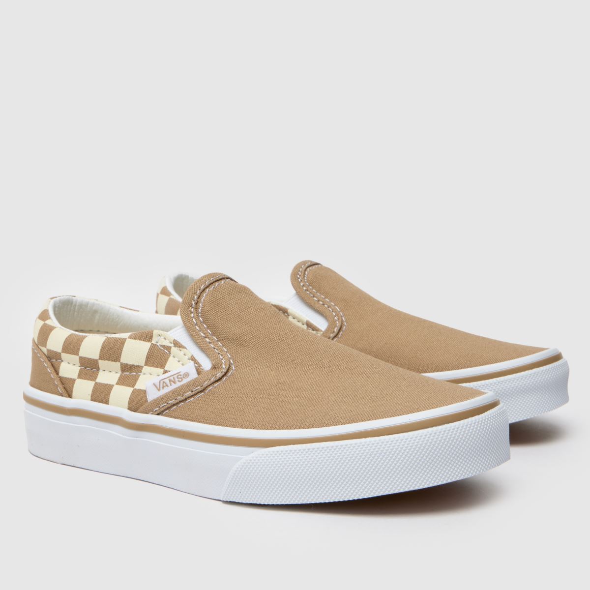Vans vita och beige klassiska slip-on juniorsneakers