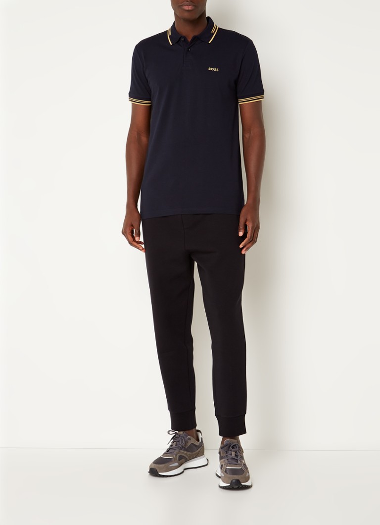 Pantaloni de trening HUGO BOSS Hadiko cu croială conică pe picioare și buzunare integrate.