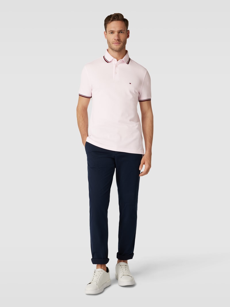 Poloshirt mit Kontraststreifen in koralle