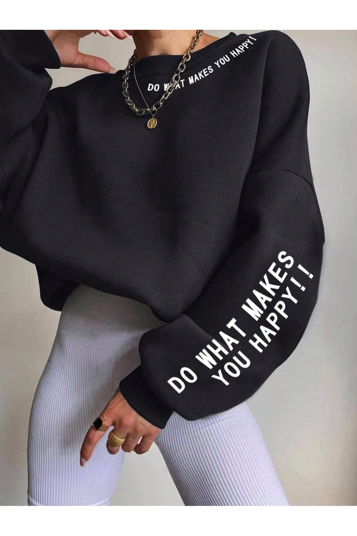 Know  Schwarzes Oversize-Sweatshirt mit Rundhalsausschnitt und „Do What Makes“-Aufdruck für Damen