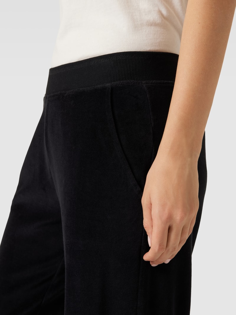 Flared Cut Hose mit elastischem Bund in schwarz