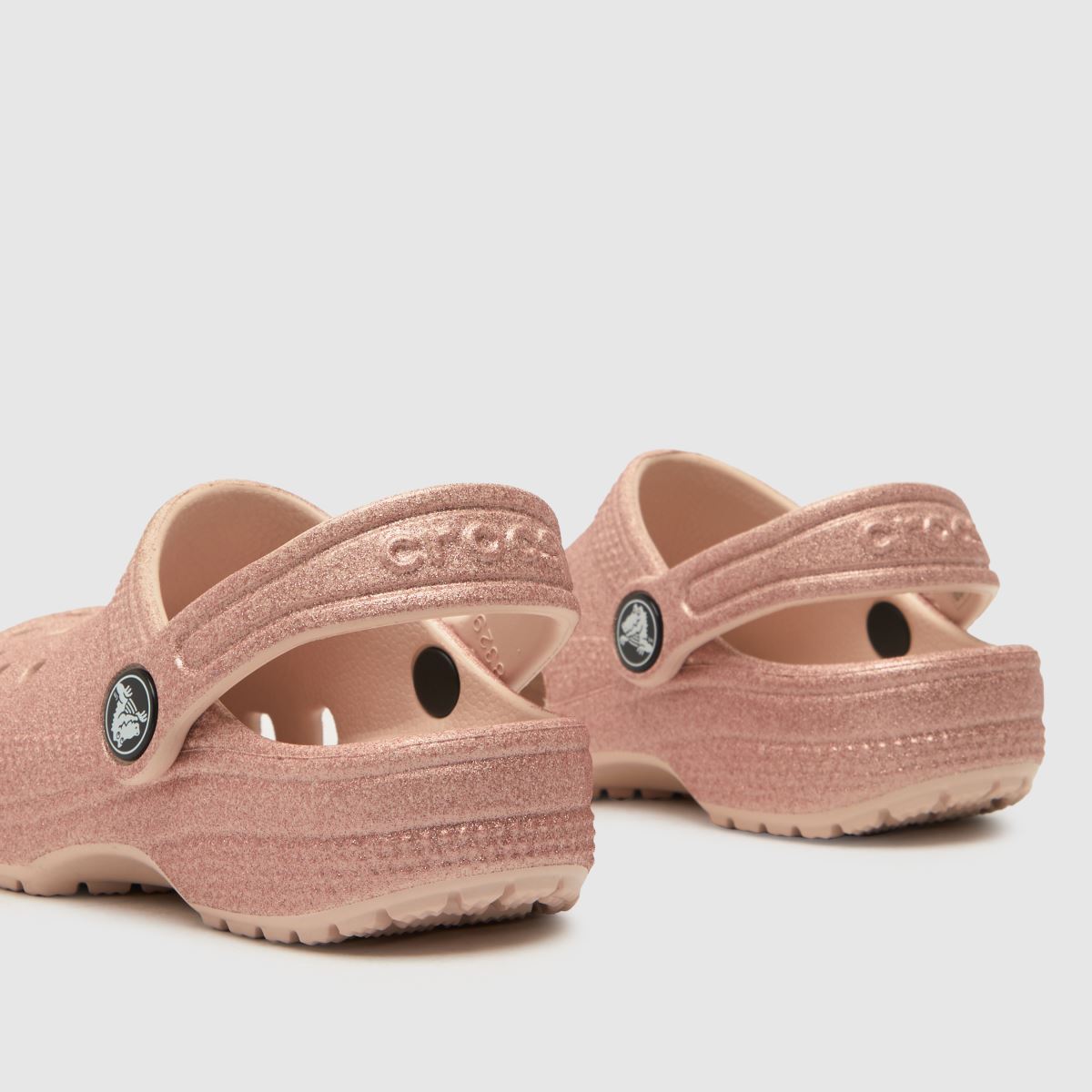 Crocs ljusrosa klassiska glitterträsko flickor småbarnssandaler