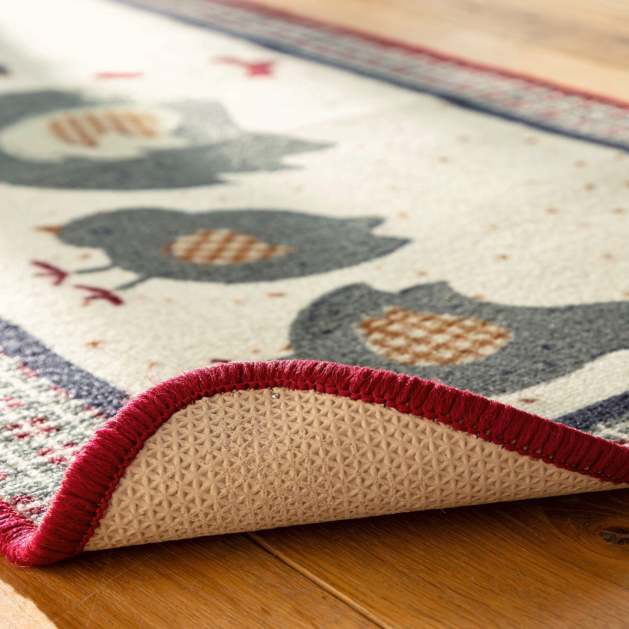 Tapis cuisine motif cocotte et ses poussins