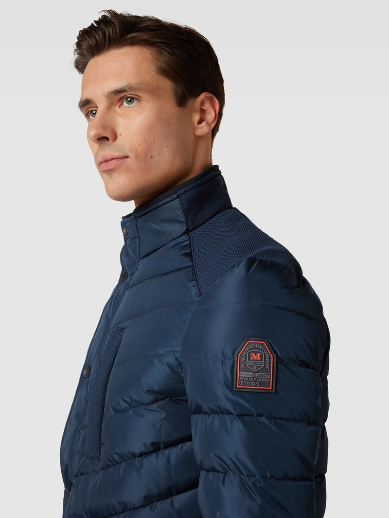 Steppjacke mit Stehkragen in marineblau