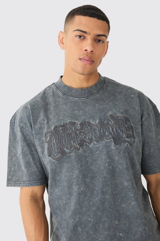 Kastiges Oversize T-Shirt mit Acid-Waschung und Worldwide-Applikation