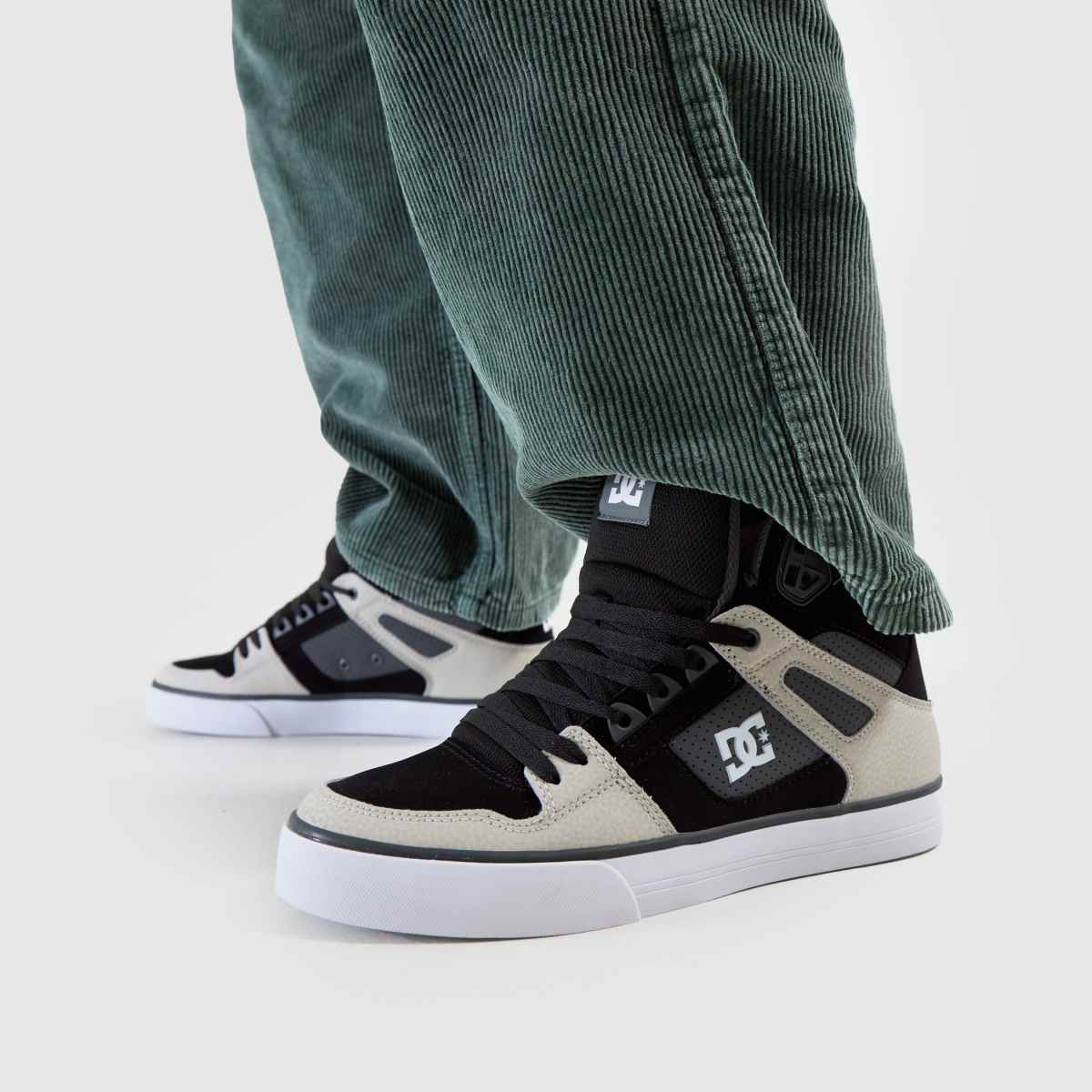 DC Pure – Svarta, höga sneakers i multifärgat material