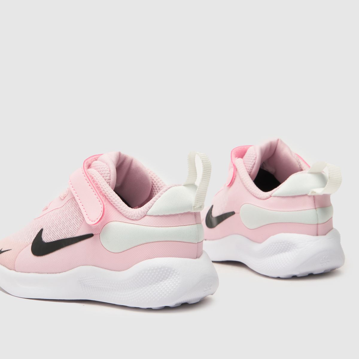 Nike ljusrosa Revolution 7 flickor småbarnsskor