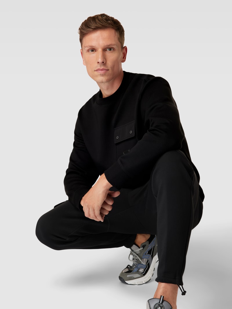 Sweatshirt mit Brusttasche Modell 'Dhaluli' in schwarz