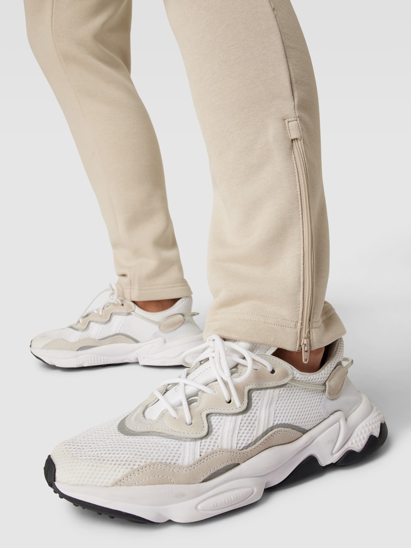 Sweatpants mit Label-Stitching in beige