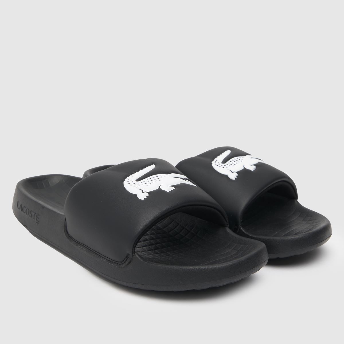 Lacoste – Serve 1.0 – Svarta och vita sandaler