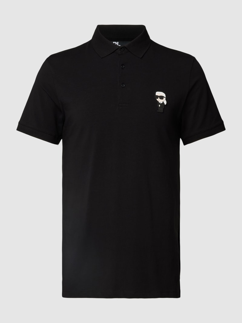 Poloshirt mit Motiv-Patch in schwarz
