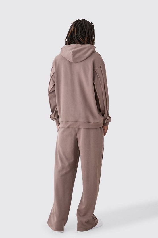 Jogginghose mit weitem Bein und Man-Stickerei